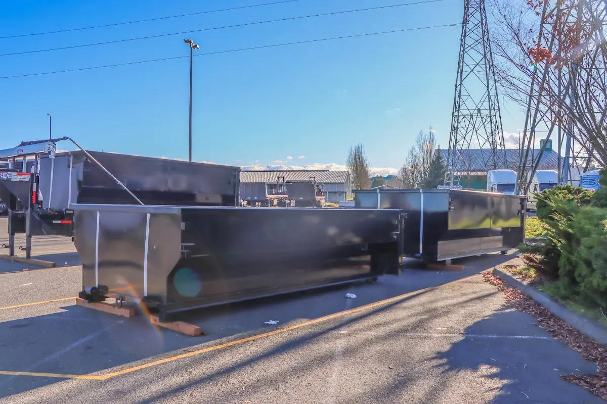 Roll-off dumpster ready for waste disposal at job site for 30 Yard Dumpster Rental in Stowe